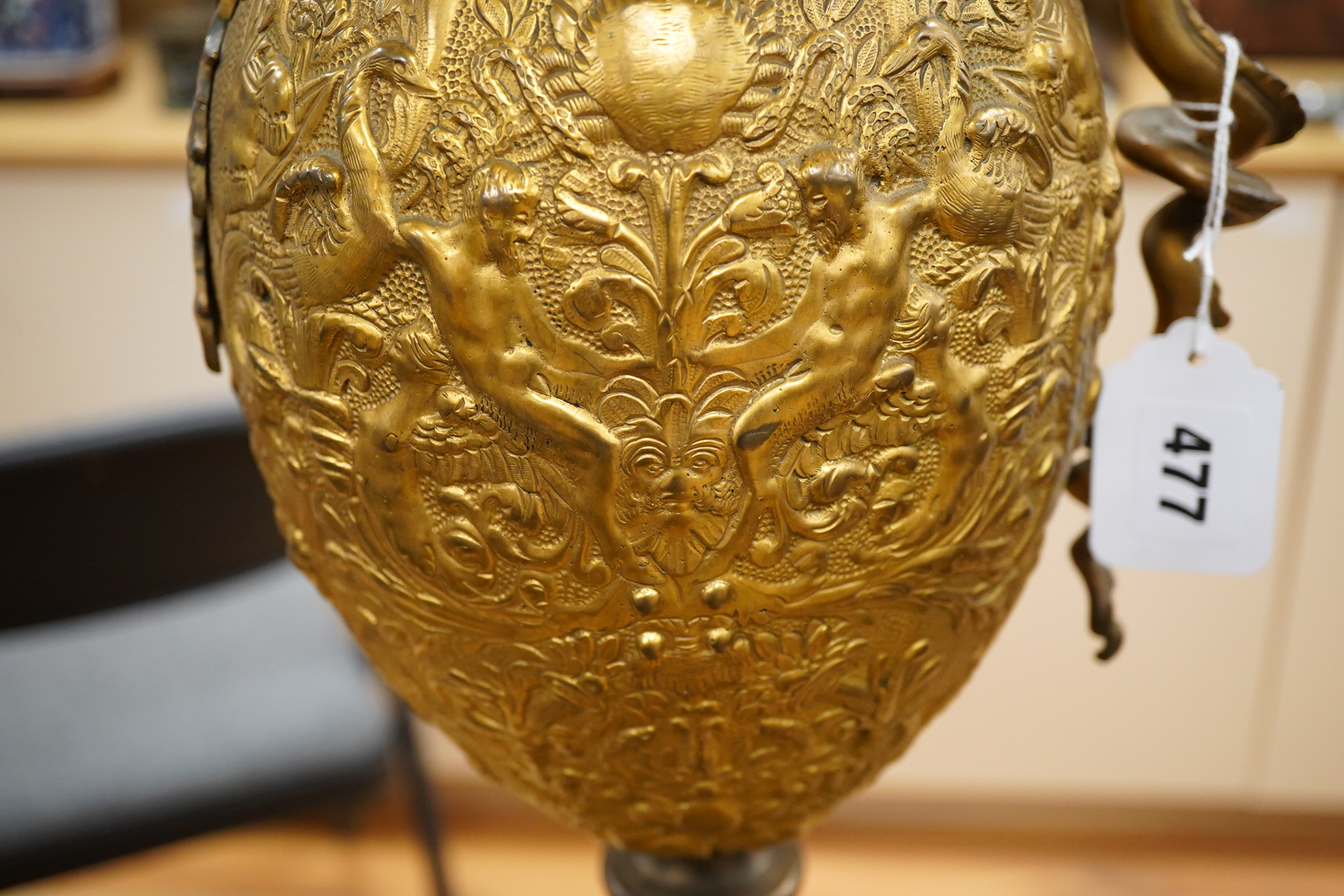 A late 19th century Renaissance-style ewer with dragon handle, 65cm high